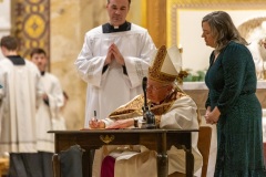 Bishop-Ricken-Signing-Decree